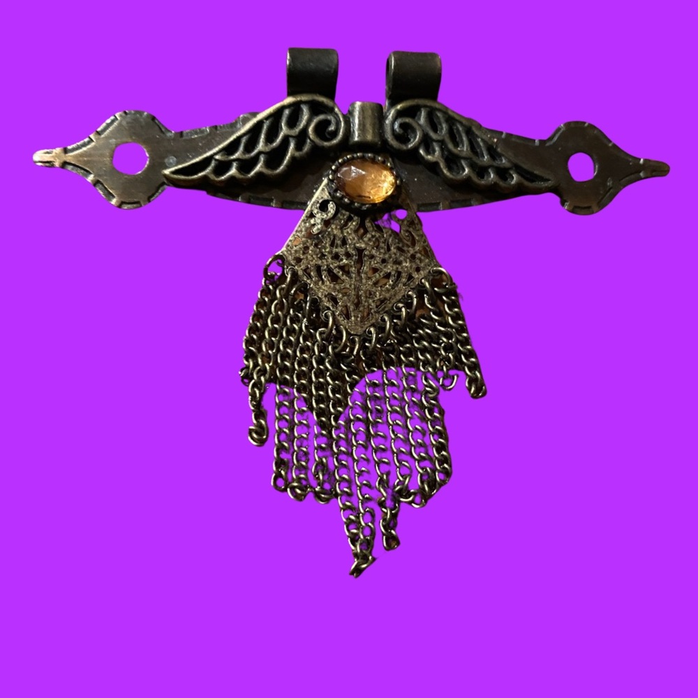 Steampunk Brass and metal tone pendant with gold stone.